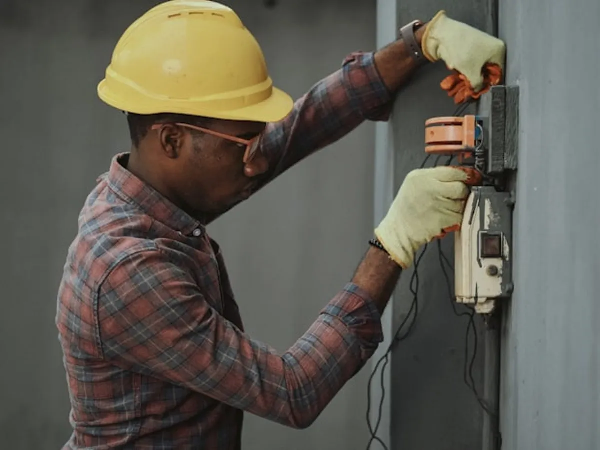 Electrician repairing household wiring in Pakistan