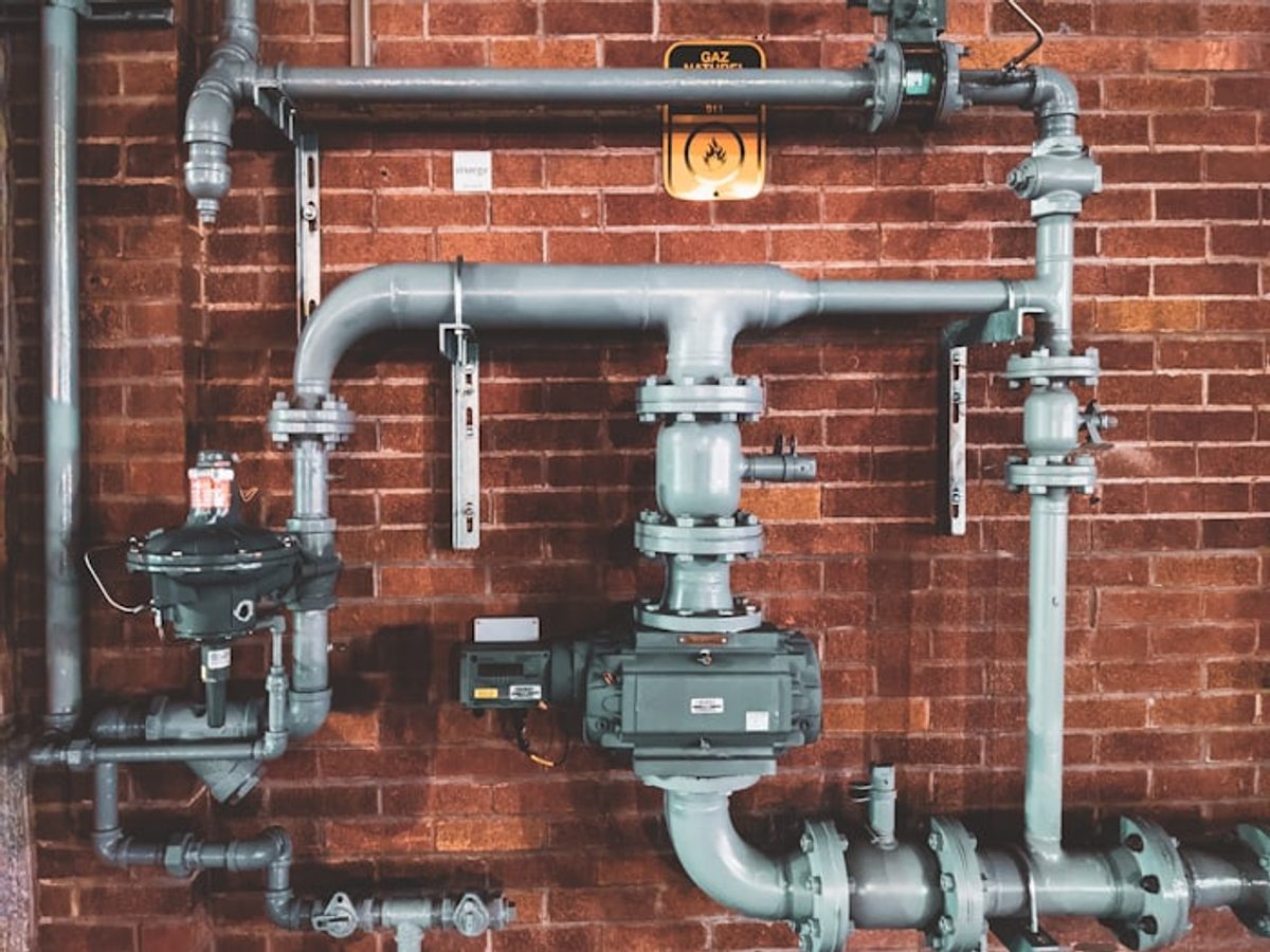 Plumbing pipework installed on a wall
